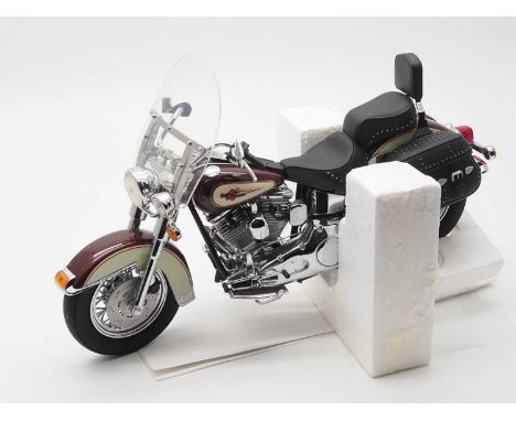 A FRANKLIN MINT 1:10 scale diecast Harley Davidson Heritage Softail Classic motorcycle - in original shipping box together wi