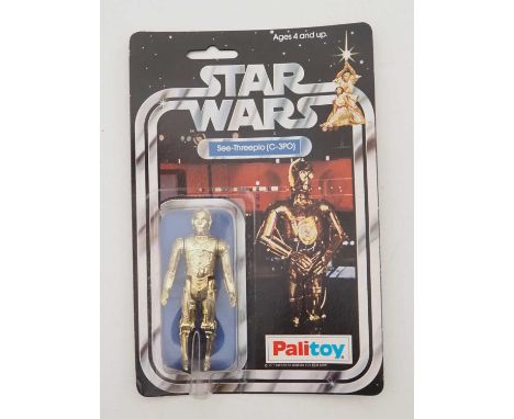 A PALITOY STAR WARS See-Threepio (C-3PO) figure on original 12 back card (SW-12B) from the first year of production in 1978 -