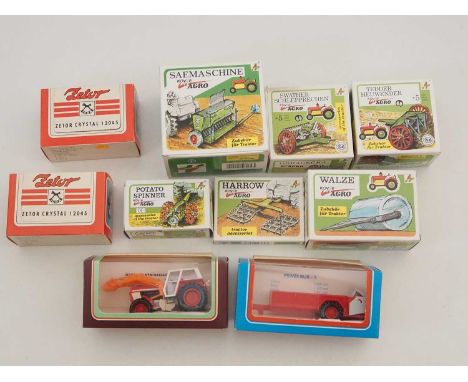 A group of Czechoslovakian/Czech produced tractor and agricultural equipment comprising: plastic variants by IGRA and tinplat