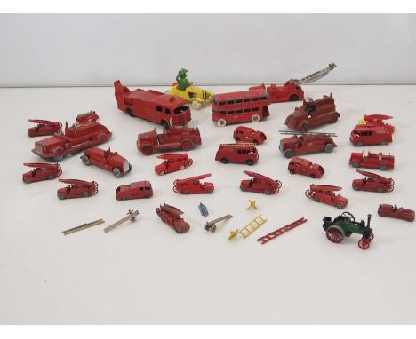 A large quantity of unboxed vintage diecast by MATCHBOX, LONE STAR, CHARBENS and others - mostly fire engines - F/G (unboxed)