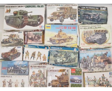 A group of unbuilt plastic military vehicle kits in various scales by TAMIYA, ITALERI and others - unchecked but appear compl