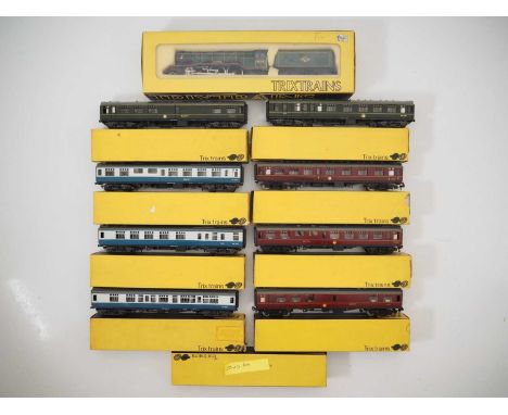A group of TRIX OO gauge model railways to include a 'Flying Scotsman' steam locomotive in BR green together with a group of 