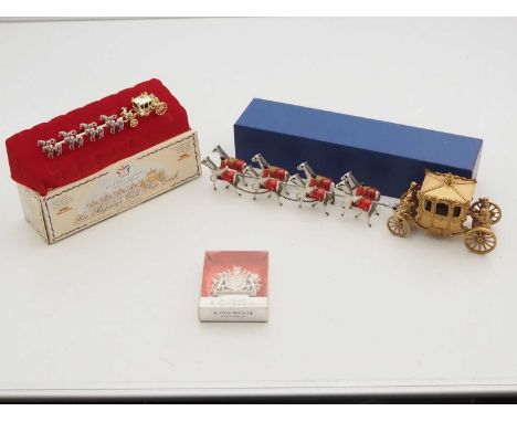 A vintage LESNEY large scale Coronation gold state coach from 1952 with horses (unboxed) together with a modern smaller scale