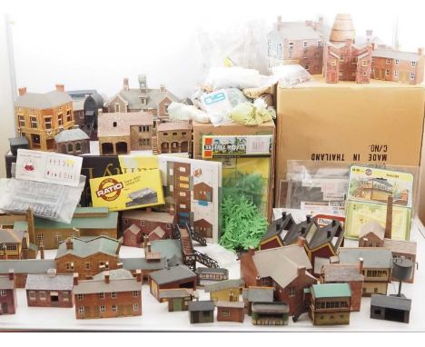 A large collection of built card and plastic OO gauge model railway kits together with a further box of kits and accessories 