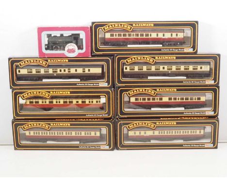 A quantity of OO gauge model railway rolling stock comprising: a DAPOL Class J94 steam loco and various MAINLINE coaches - VG