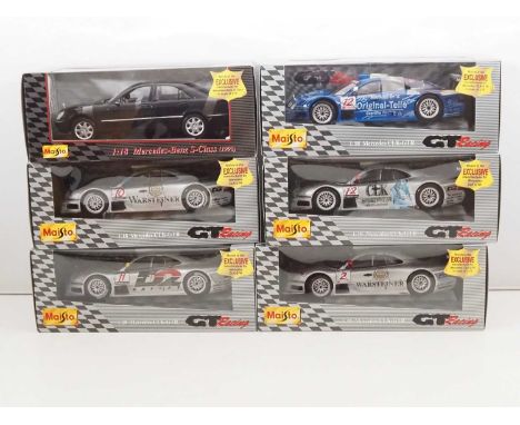 A MAISTO Trade Box containing six 1:18 scale cars, mostly GT racing examples - all as new in box - VG/E in VG/E boxes (6)