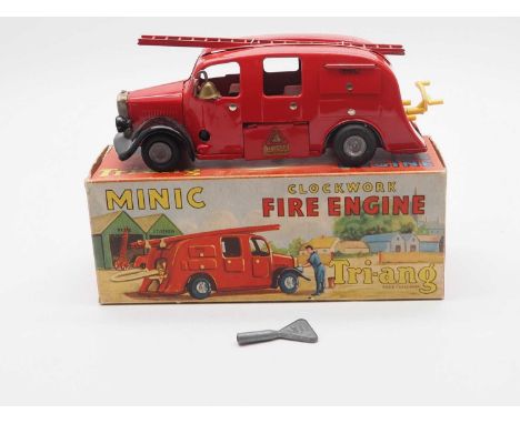 A TRIANG MINIC 62M post war tinplate clockwork fire engine - G/VG in G box