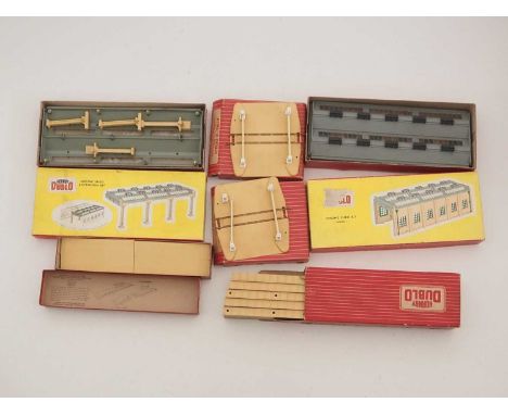 A group of HORNBY DUBLO boxed OO gauge buildings and accessories all of plastic construction - to include a 5005 Engine Shed 