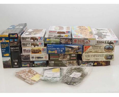 A group of unbuilt plastic military vehicle and figure kits in various scales by AIRFIX, TAMIYA , REVELL  and others - unchec