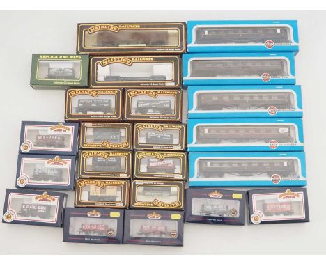 A quantity of OO gauge rolling stock by AIRFIX, MAINLINE, BACHMANN and REPLICA - VG in G/VG boxes (23)