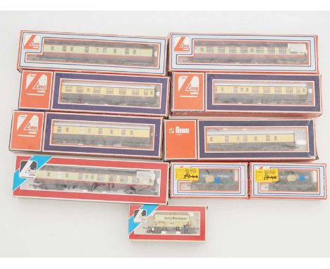 A quantity of OO gauge rolling stock to include wagons and coaches by LIMA - G/VG in G boxes (10)