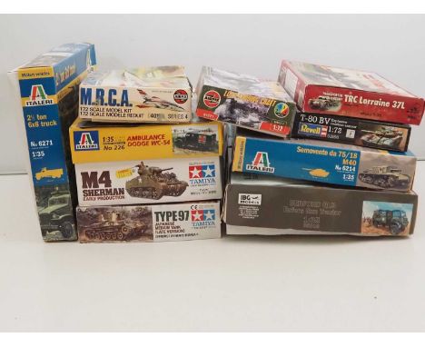 A group of unbuilt plastic military vehicle kits in various scales by IBG, ITALERI, TAMIYA and others - unchecked but appear 