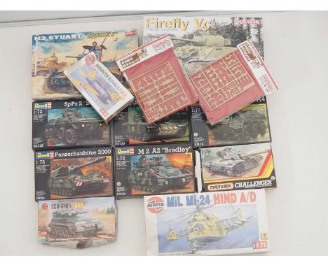 A group of unbuilt plastic military vehicle kits in various scales by DRAGON, AIRFIX, REVELL and others - unchecked but appea