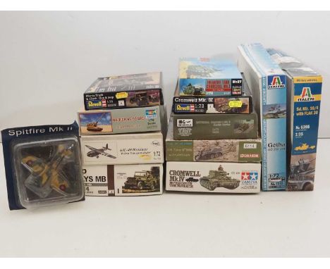 A group of unbuilt plastic military vehicle kits in various scales by HASEGAWA, REVELL, ITALERI and others - unchecked but ap