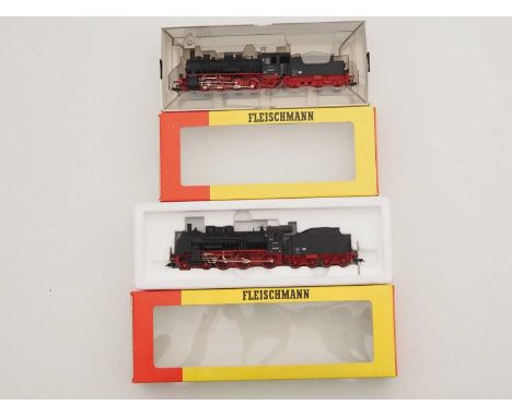 A pair of FLEISCHMANN HO gauge German Outline steam locomotives comprising numbers 4152 together with 4164 both in DR black l