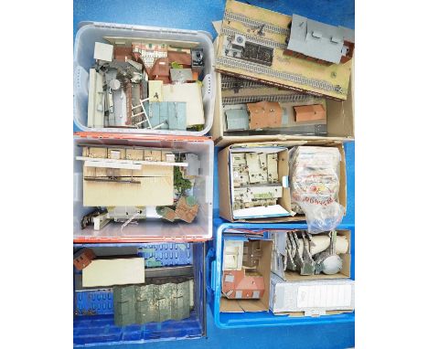 A large quantity of HO gauge built model railway buildings in 6 crates/boxes to include other accessories and some TRIX TWIN 