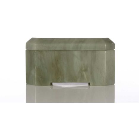 A jade box and cover, of rectangular form with canted corners, on short bracket feet, 11cm wide, 5.5cm highThe interior of th
