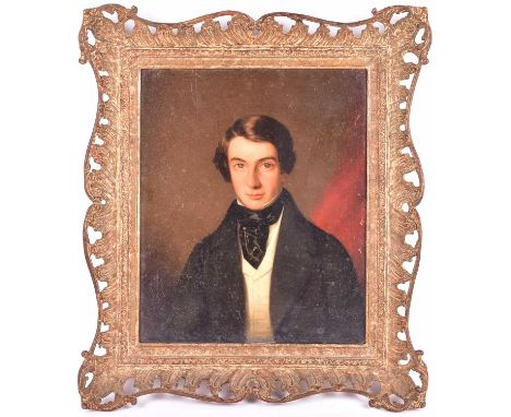 Attributed to Stephen Pearce (1819-1904), a portrait of a gentleman in a black frock coat, oil on panel, 33 cm x 26.5 cm in a