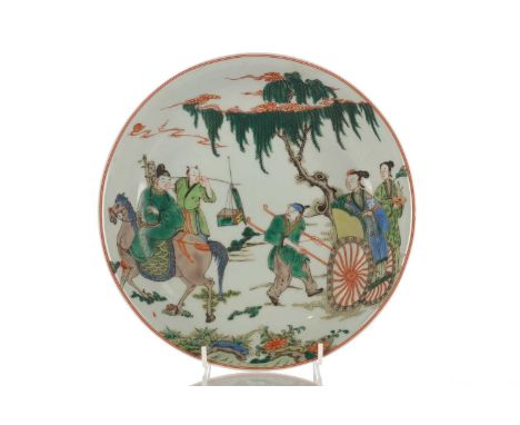 A Chinese Famille Verte dish, painted with a scene taken from the Romance of the Western chamber, the underside painted with 