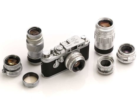 A Leica III G 35 mm camera body (No 858578) fitted a 35mm Summicron 1:2 lens, together with further lenses and equipment incl