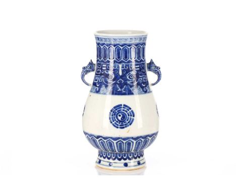 A Chinese porcelain blue &amp; white Hu form vase, with bixie mask and tongue handles, painted with Taotie masks and Bagua me
