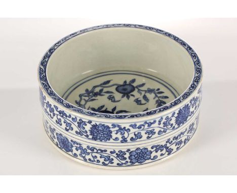 A Chinese porcelain blue &amp; white censer, the interior painted with peaches on a leafy branch, the rim with a continuous s