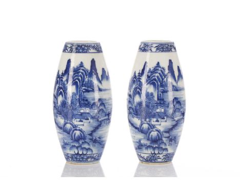 A pair of Chinese blue &amp; white ovoid vases, painted with figures before buildings and a mountainous background, verso a f