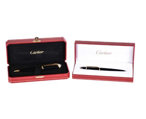 A Diabolo de Cartier ballpoint pen, with blue cabochon, serial number 250610, in presentation case with guarantee and instruc