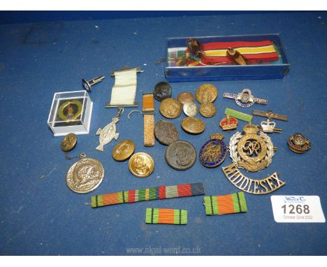 A quantity of Military Badges and Buttons including a Royal Navy enamel pin badge, Royal Engineers badge, Navy buttons, red c