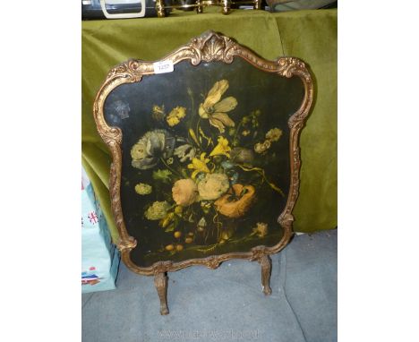 An Alsonea fire screen with floral display decoration, 29'' tall x 20'' wide.