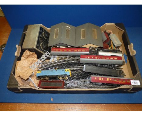 A quantity of Model train miscellanea to include train carriages, buildings, twin power supply unit etc.