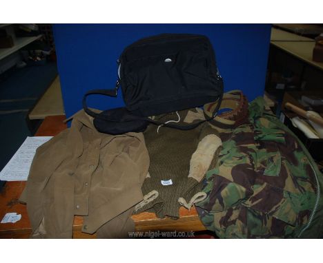 A gents camouflage coat, short suede jacket, army wool jumper, black skippers hat, holdall cartridge belt.