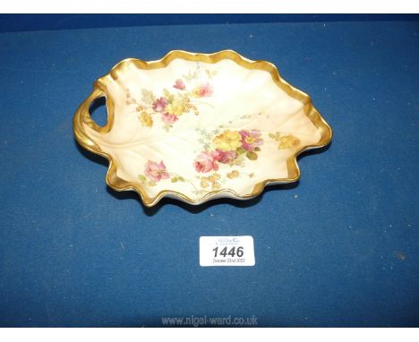 A late Victorian Royal Worcester leaf form blush ivory dish well painted with flowers and finely gilded. Unsigned. Date code 