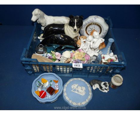 A quantity of china including Jasperware bud vase, Lladro clock, Poole dolphin, 'Old Country Roses' clock, Wade animals, Coop