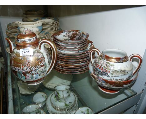 A quantity of oriental tea ware including plates, saucers, teapot, slop bowl etc., some damage.