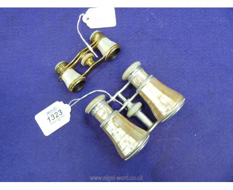 Two pairs of early 20th century Paris made gilt brass opera glasses veneered in mother of pearl.