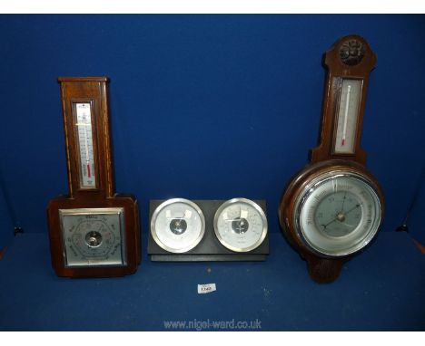 A banjo shaped Barometer and a square faced Barometer, plus a Metallic thermometer.