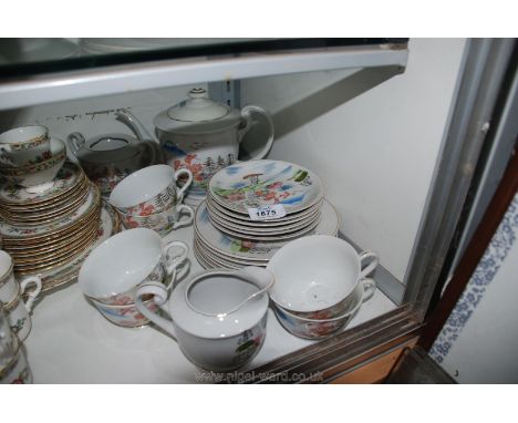 A quantity of E &amp; O Oriental teaware, comprising six place setting and teapot, milk jug, sucrier, lid missing, a/f. decor