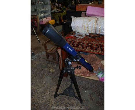 A large blue Bresser Skylux EL 70 x 900 Telescope with Bresser end tripod and star diagonal mirror viewer plus various eye pi