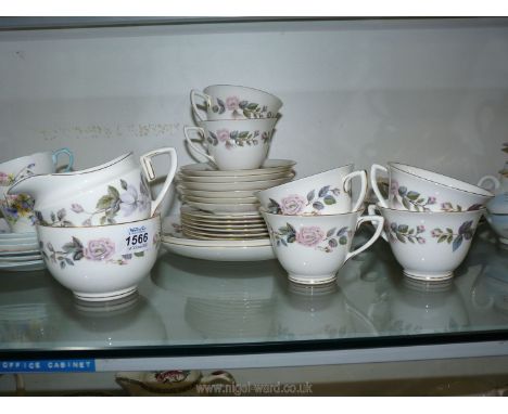 1961 Royal Worcester June Garland set including six cups, saucers, and tea plate, two cake plates, milk jug, and sugar bowl.