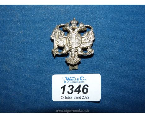A British Army cap badge for the 1st Dragoon Guards.