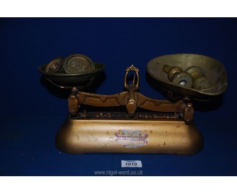 A J and J Siddons Ltd. weighing scales with weights.