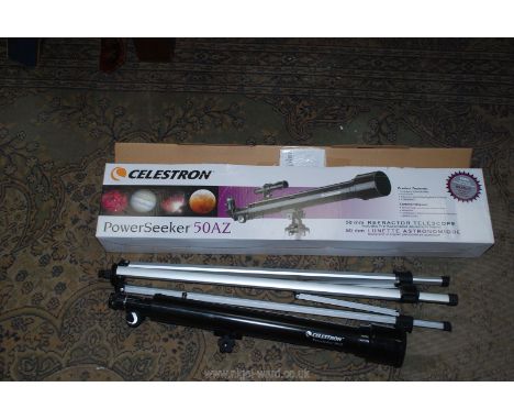 A Celestron Power Seeker 50AZ, refractor Telescope in box with tripod and receipts.