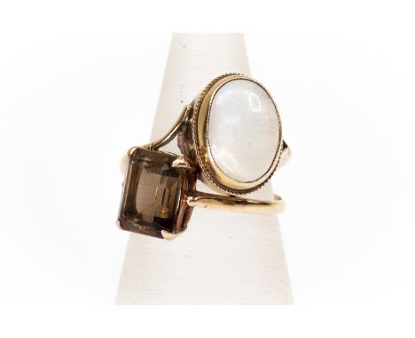 A 9ct gold smoky quartz ring, claw set emerald cut stone, size N, along with a 9ct gold and oval moonstone ring, rubover set,