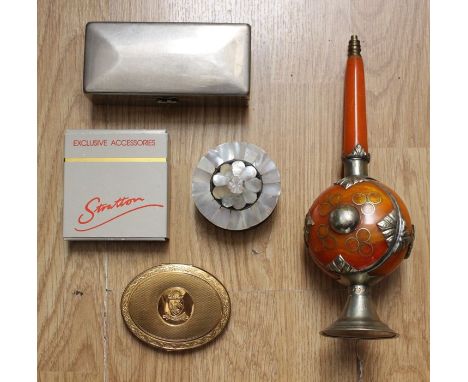 An Amberline and metal incense stick holder and a mother of pearl covered box. A razor box two powder compacts.