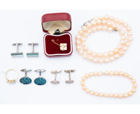 A cultured pearl necklace and matching bracelet, peach tone, along with a gilt metal three stone paste set ring, three pairs 