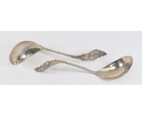 A pair of Dutch silver ladle spoons, barley twist stems with pierced leaf finial, date letter probably 1906