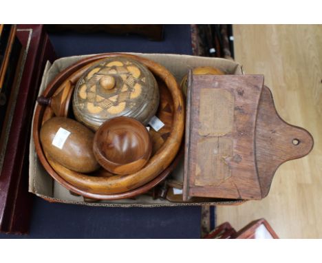 Treen items to include maple pot and cover, a Welsh yew pedestal pot with finial topped lid, a Mauchline ware string dispense