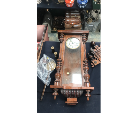 A late 19th Century walnut Vienna wall clock, ball finial (pendulum)