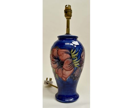 A Moorcroft table lamp, blue ground